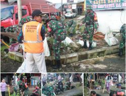 Personel Kodim Tator Gotong Royong Bersama Warga Bersihkan Selokan