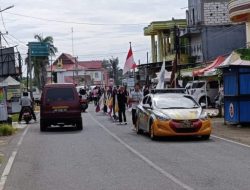 Personel Polsek Marioriawa Kawal Giat Devile Kontingen Pelajar SMAN 6 Soppeng